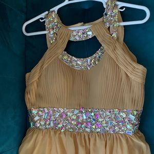 Long lovely champagne colored dress.